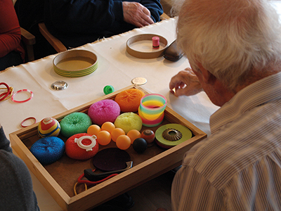 A user chooses and arranges objects during a workshop