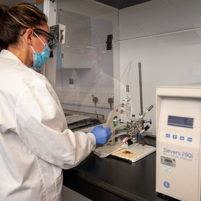 A researcher using equipment in St Thomas' CRF