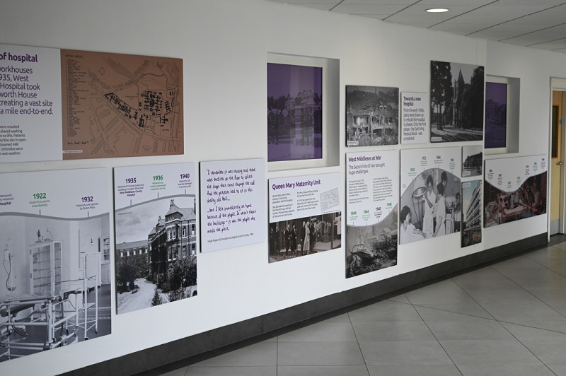 The exhibition includes newspaper cuttings, old photographs, and archive materials from the hospital's history