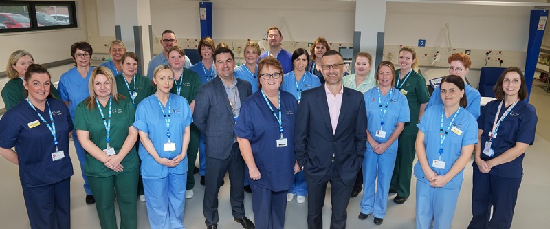 Staff prepare to treat the first patients in the new unit