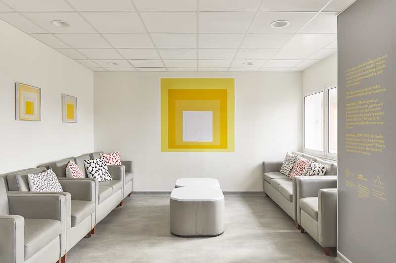 Inspired by the Alberses' iconic geometric patters, the pictures are in shades of orange and yellow to promote healing
