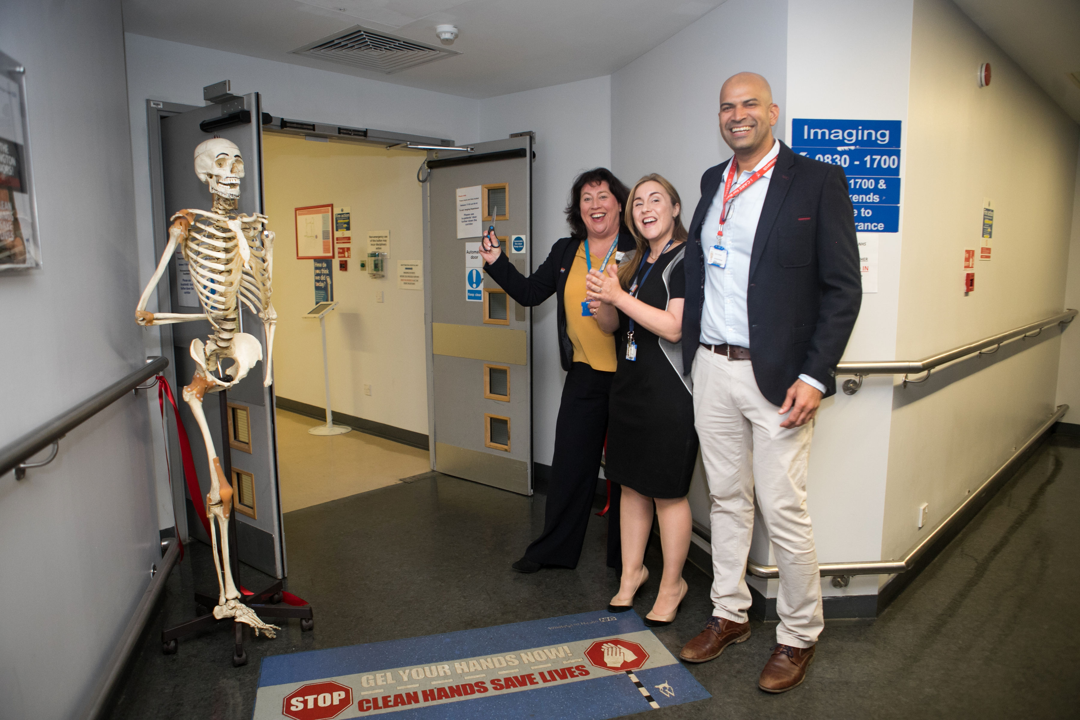 From left: Whittington Health chief executive, Siobhan Harrington; Cheryl Hill, imaging services manager; and Adrian Trinidade, operational manager for imaging cut the ribbon on the imaging suite which has undergone a £4m transformation