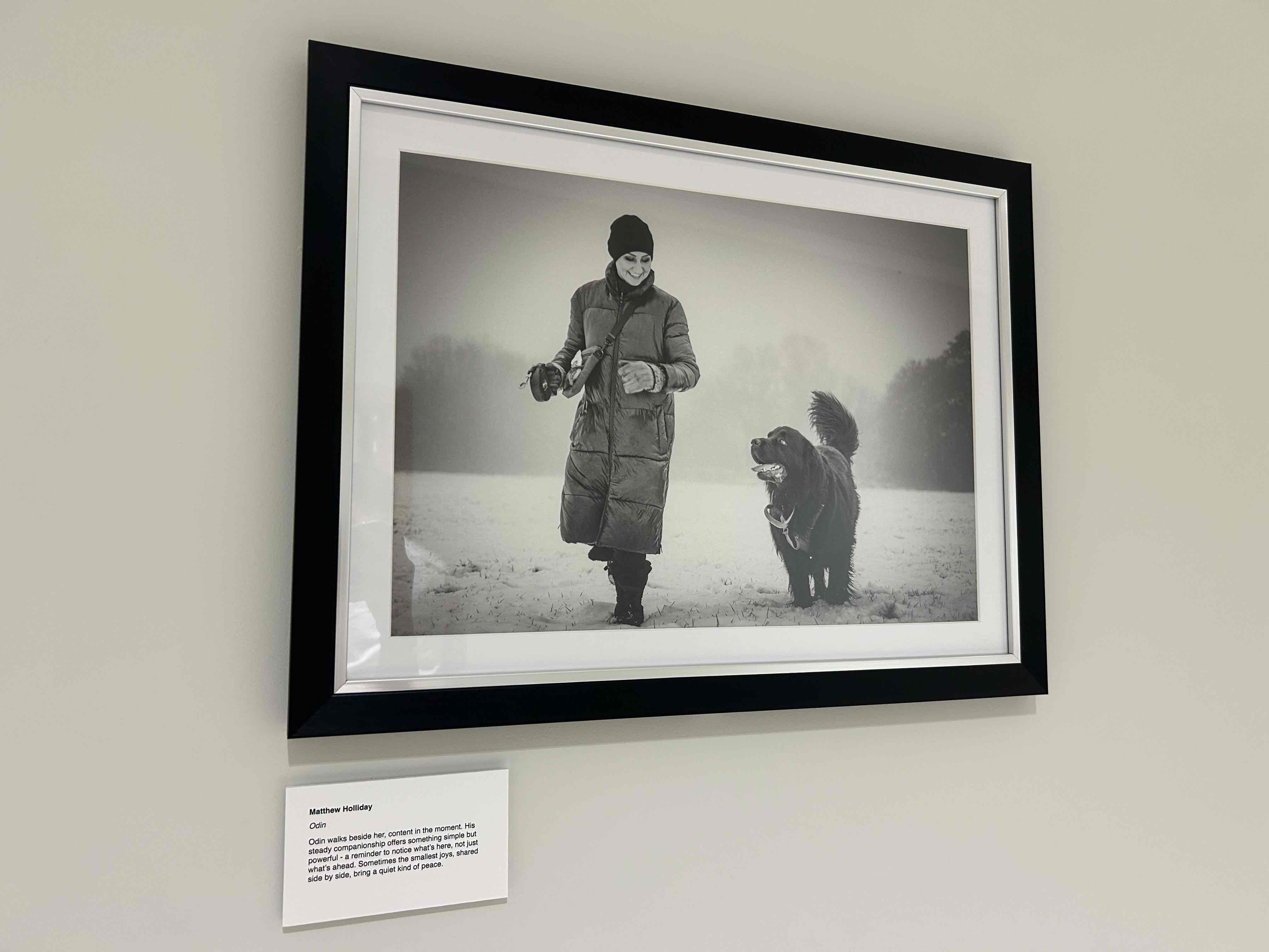- A winner of the photography competition that has their work on show -