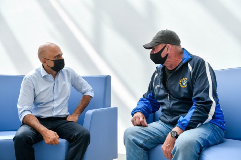 Javid chats to patient, George Crayston, from Egremont, Cumbria, who is currently having radiotherapy treatment