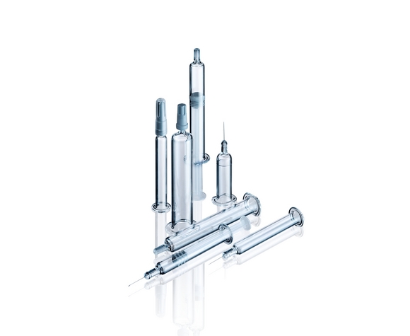 Laser coding system for glass syringes