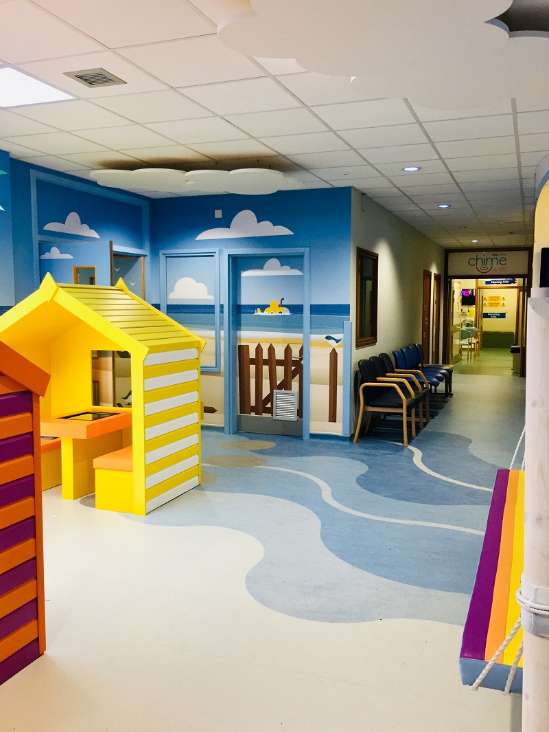 Flooring from Forbo Flooring Systems was used to create a sand-like texture and mimic waves