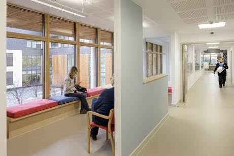Informal waiting areas with views onto courtyard are dotted around the building