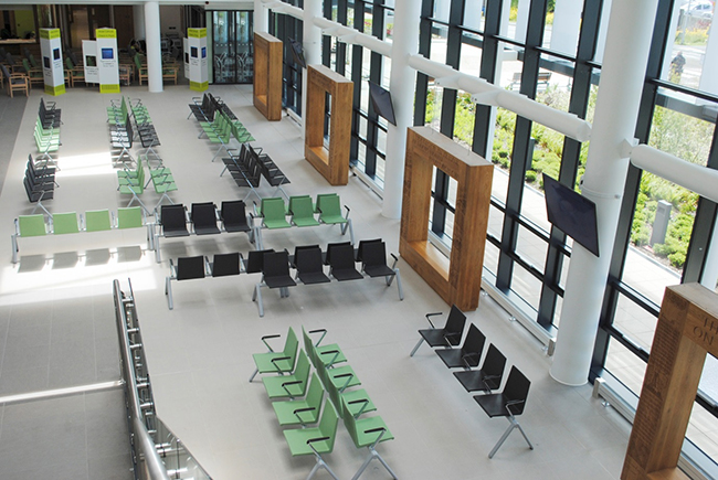Teal reception furniture chosen following 9-month trial at £60m Morriston Hospital project